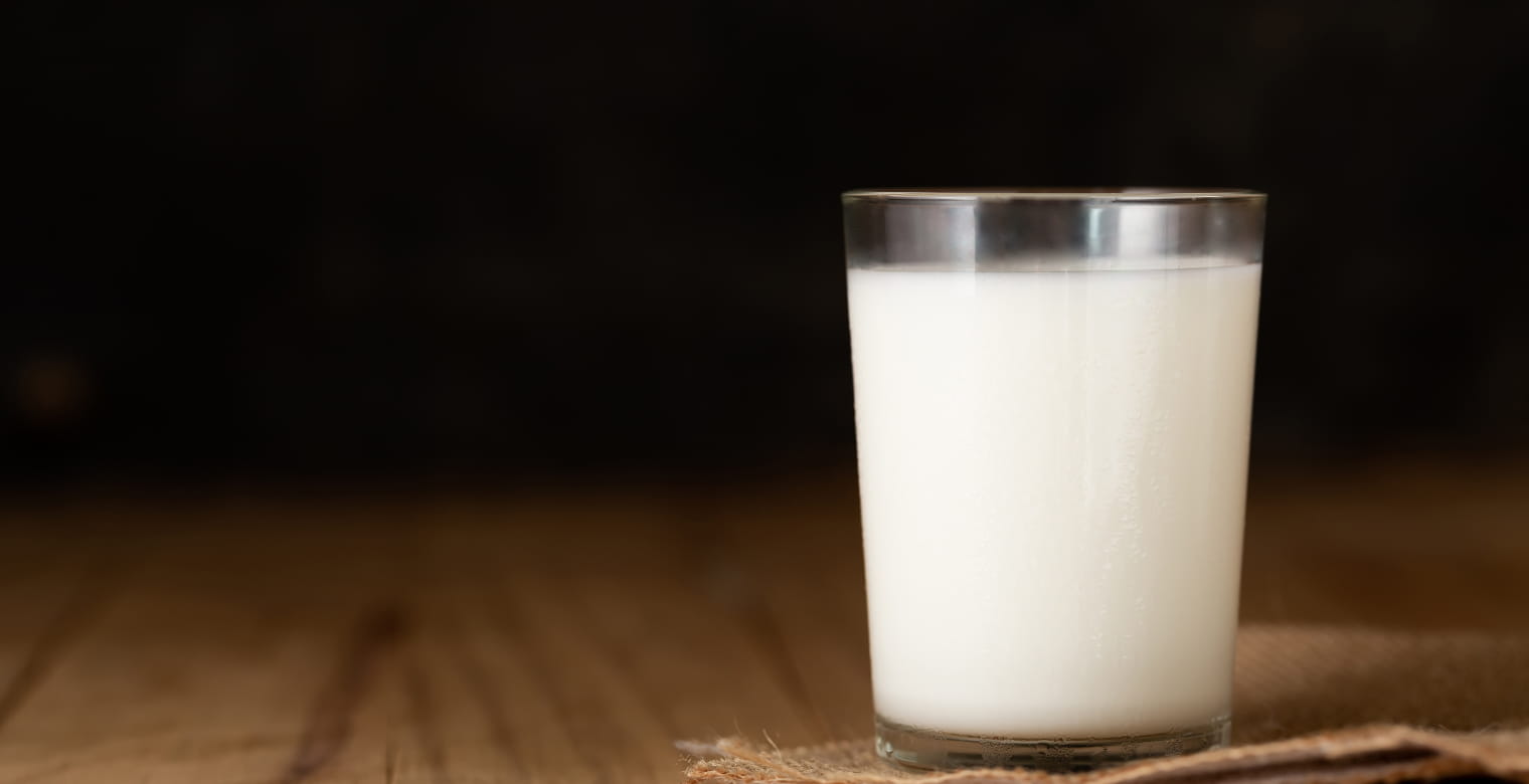 glass of milk against 